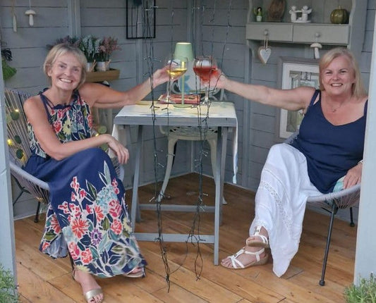 Rachel and Ita, co-founders of Midlife Blush, celebrating female friendship over wine