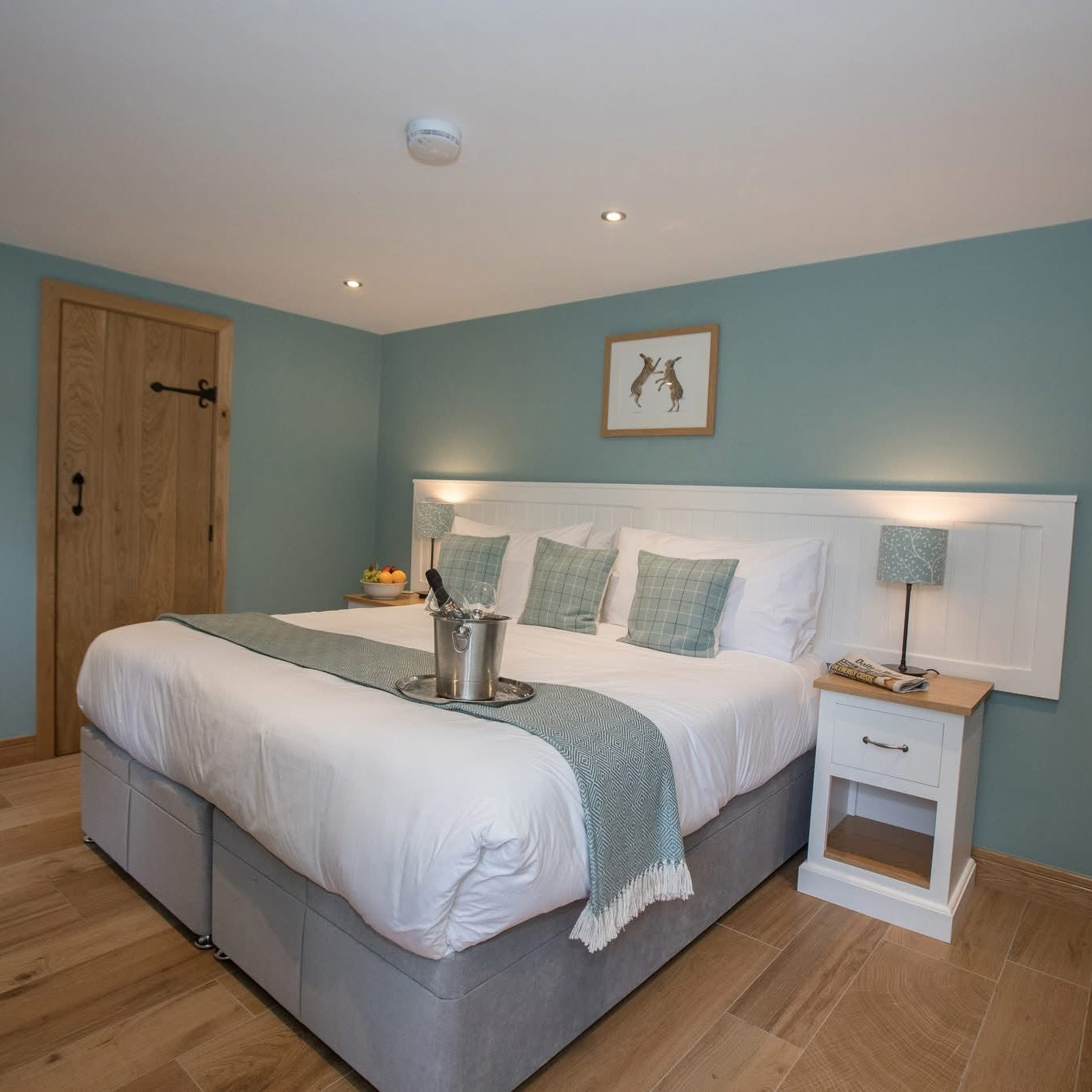 Luxury en-suite bedroom with duck egg blue walls at Midlife Blush women's retreat, Yorkshire


